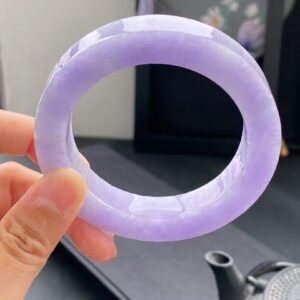 Serenity Circle: A Masterfully Carved Lavender Jadeite Bracelet